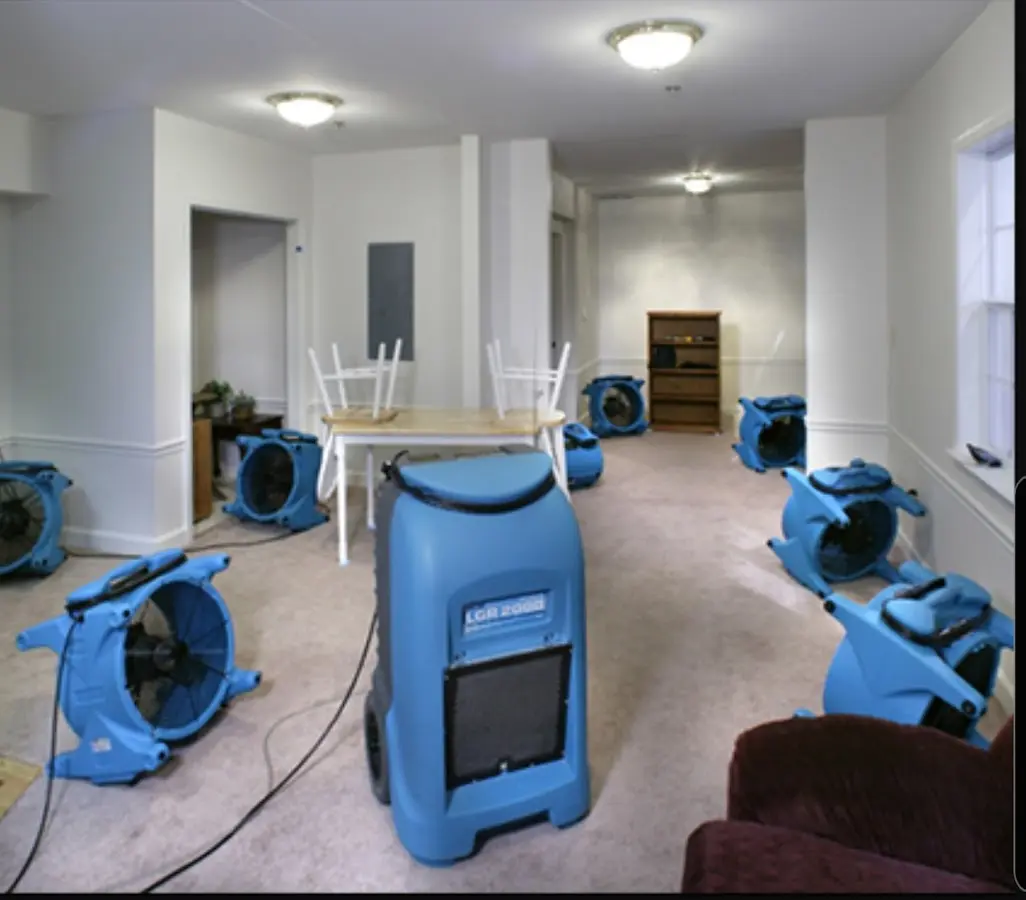 Air movers and dehumidifier setup for Water Extraction & Removal in Parsons